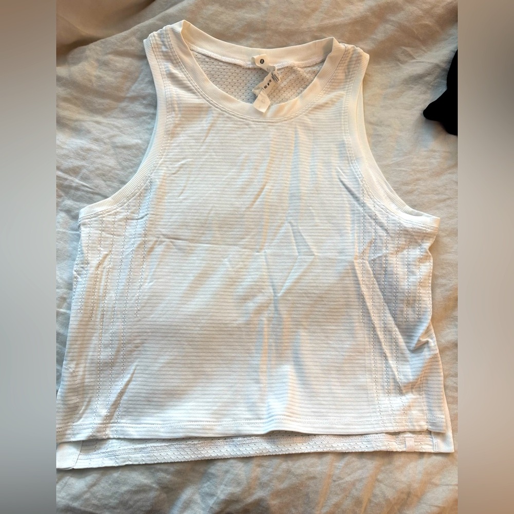 Lululemon train to be tank *high low hem